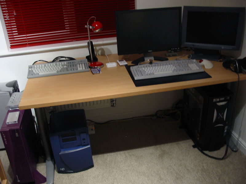 My workstation area; Silicon Graphics Indigo^2 and Octane^2 workstations and my Linux PC.