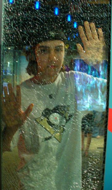 Here I am behind a piece of shattered glass, oh joy.