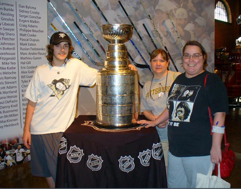 Here I am with my mom (the one in the awesome Beatles T-shirt), and my grandma, next to the stanley cup, yay