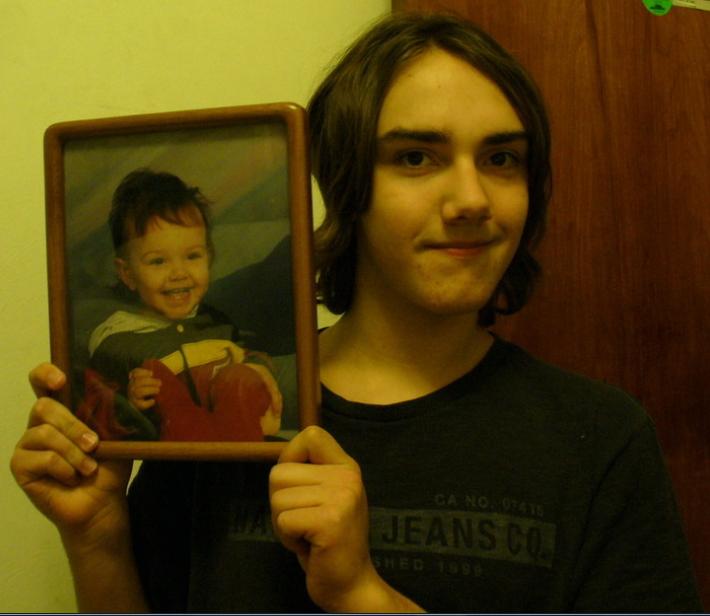 Here is me as a young fool, holding a picture of myself as a younger, happier, fool.
