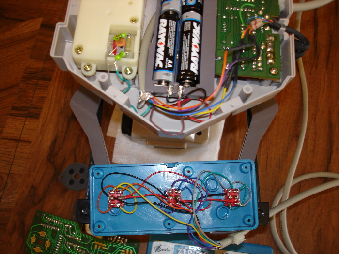 CLOSE UP OF WIRES. 2 POLE 3 POSITION ON-OFF-ON SWITCH. MOMENTARY ON. SMALL JUMPER WIRES TO CHANGE THE POLARITY FOR REVERSE DIRECTION. PCB IS BYPASSED.