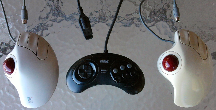 Logitech Trakman 804122-1000 and Genesis Controller.jpg