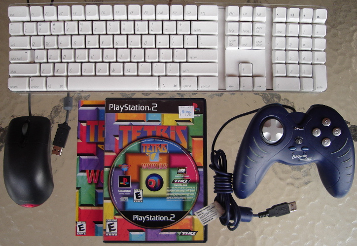 Mac Keyboard - MS LED Mouse - PS2 Tetris Worlds - Gravis Eliminator Gamepad Pro.jpg