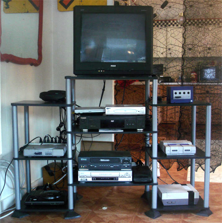 This is my main setup. I keep my Nintendo, Super Nintendo, Gamecube, GEnesis, and PLaystation 1 hooked up at all times. I never know when the urge to play an old video game will strike.  Two input switches on the top left control the selection.