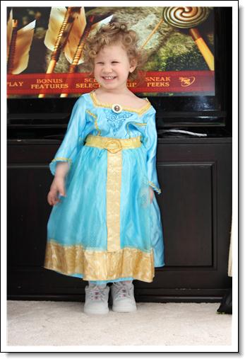 And then we opened presents, of which was the "Brave" princess costume and some stringing beads: