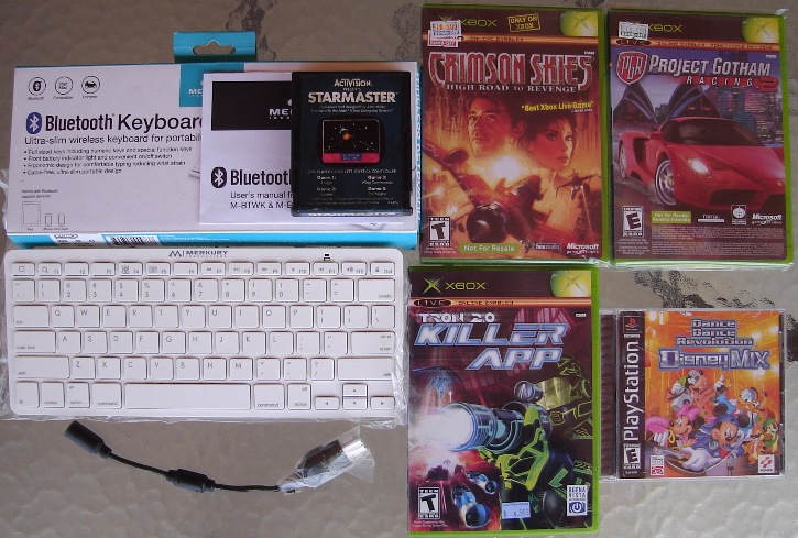 0 Finds - Blue Tooth Keyboard - 2600 StarMaster - XBox Break Away Cable - Crimson Skies - Project Gotham Racing 2 Arcade Live - Tron 20 Killer App - Disney Dance Revolution - .jpg