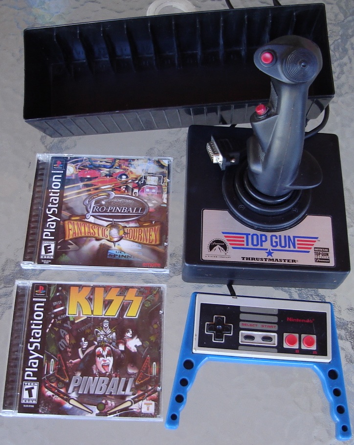 0 Finds 2600 12 Cart Tray - PS1 Proi Pinball fantastic Journey - PS1 Kiss Pinball - Thrustmaster Top Gun Flight Stick 5459487 - NES Gamepad Pro Power Grip Toysmith.jpg