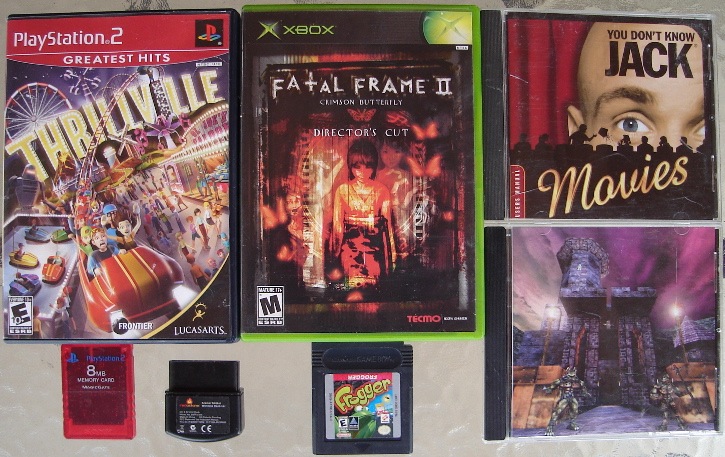 0 Thrillville - Fatal Frame II Directors Cut - PS2 Memory Card - PS2 Guitar Hero Kramer Sensor - GBC Frogger - PC You Dont Know Jack Movies - Mac Unreal.jpg