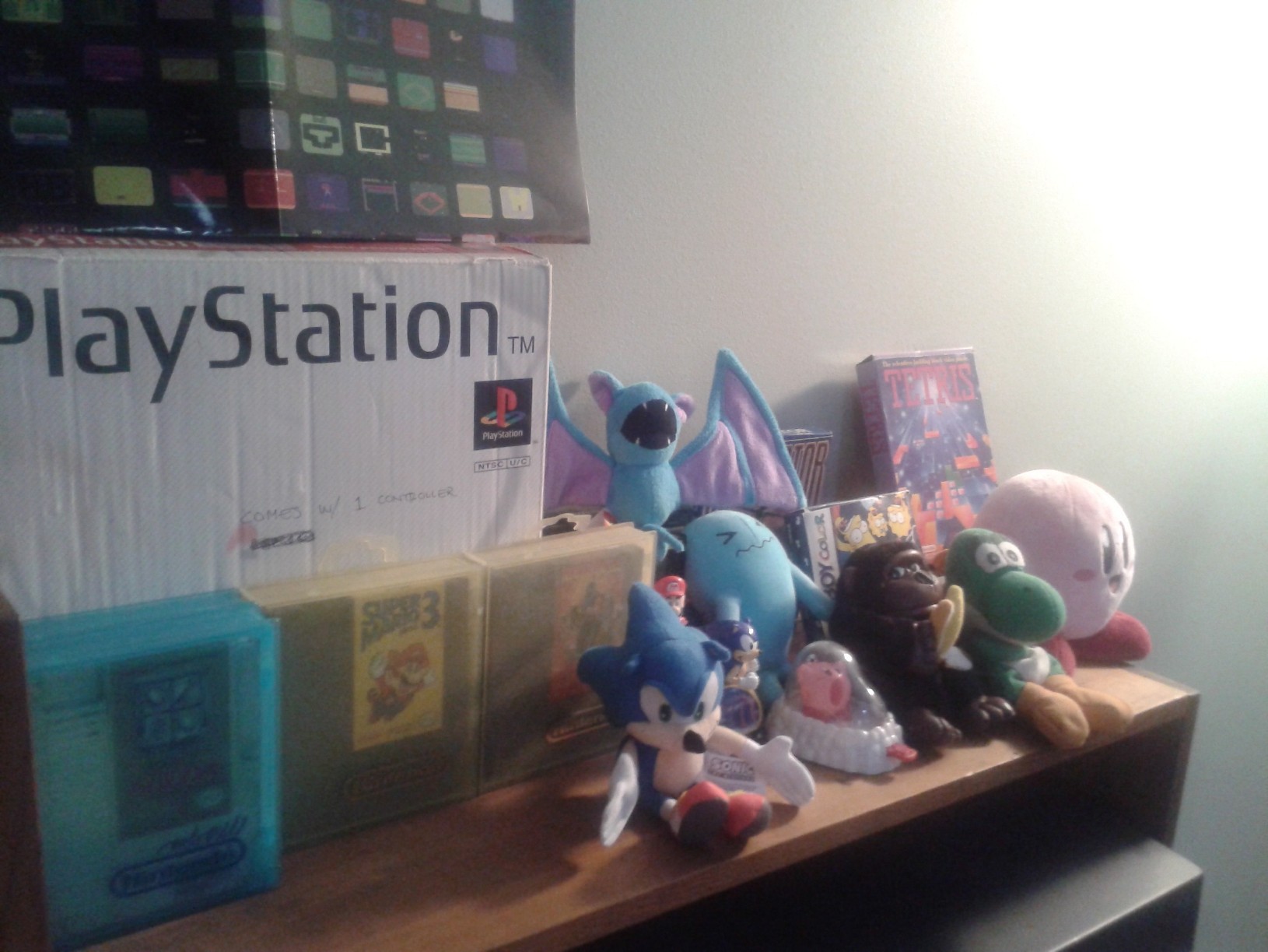 I need a better way to display these so I can show off the boxes better. And no I didn't write on the PS box, some idiot did that. Anyone know how to remove pen marks from a box?