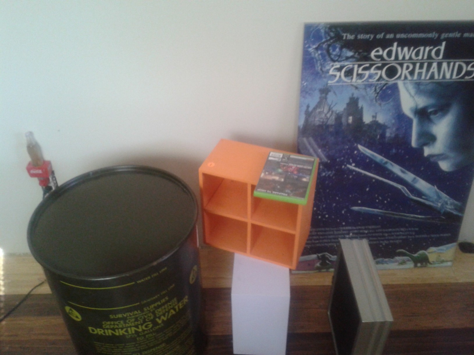 Excuse the mess, but this is under the shelf of figures, where I want a cubby or something.