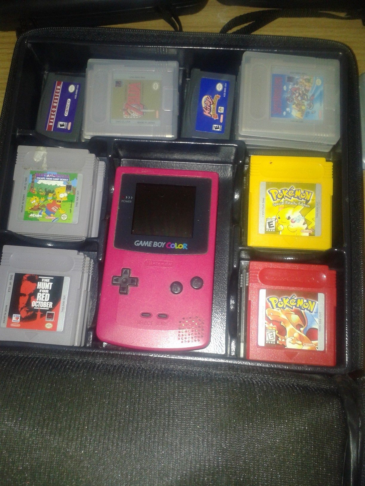 All my Gameboy games. I have to unzip this to see it, not the greatest way to store them. And why yes I did have a PINK gameboy :D